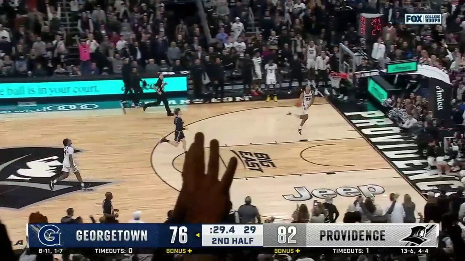 Devin Carter throws down a NASTY windmill jam to seal Providence's victory over Georgetown